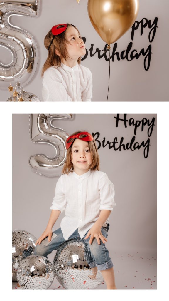 detalle sesion cumpleanos infantil con decoracion rojo y dorado estilo limpio y natural