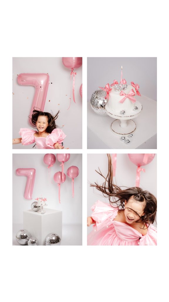 niña de 7 años en sesión de cumpleaños en estudio con globos y decoración en tonos rosas.